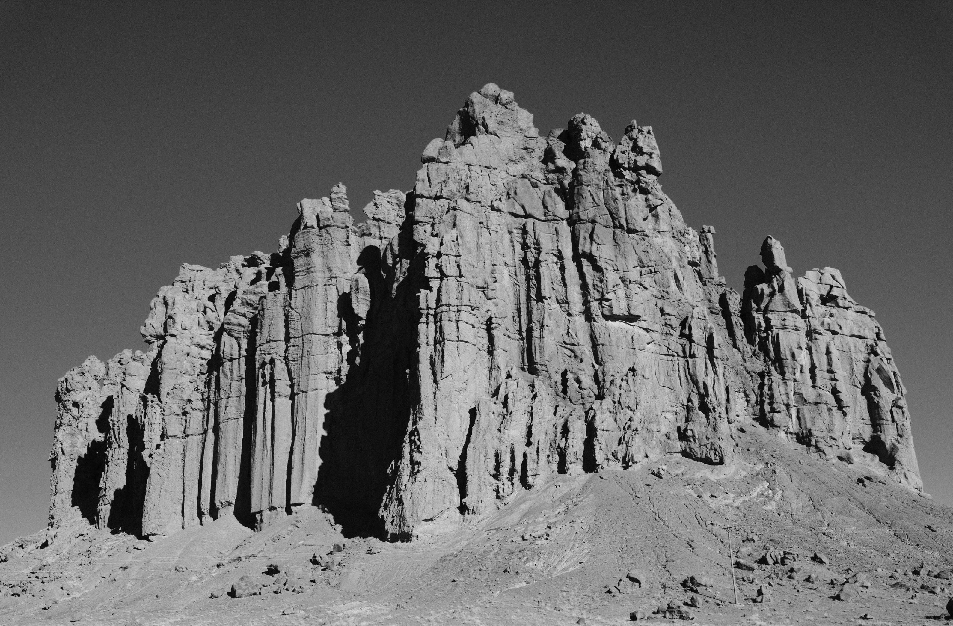 The road through Arizona, New Mexico, and Colorado on the way to Mesa Verde National Park in black and white.